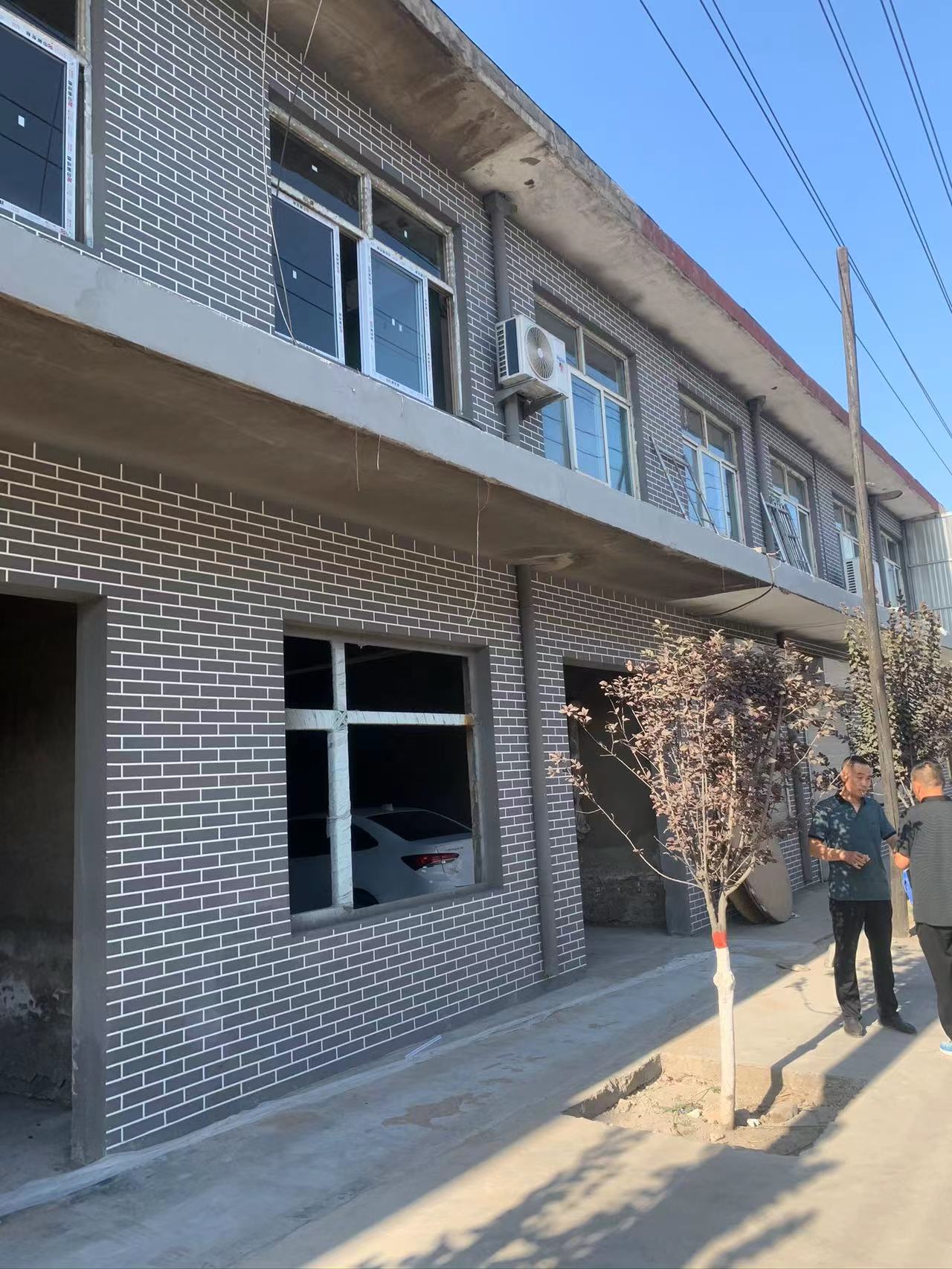 这种灰色砖纹真石漆套什么定额